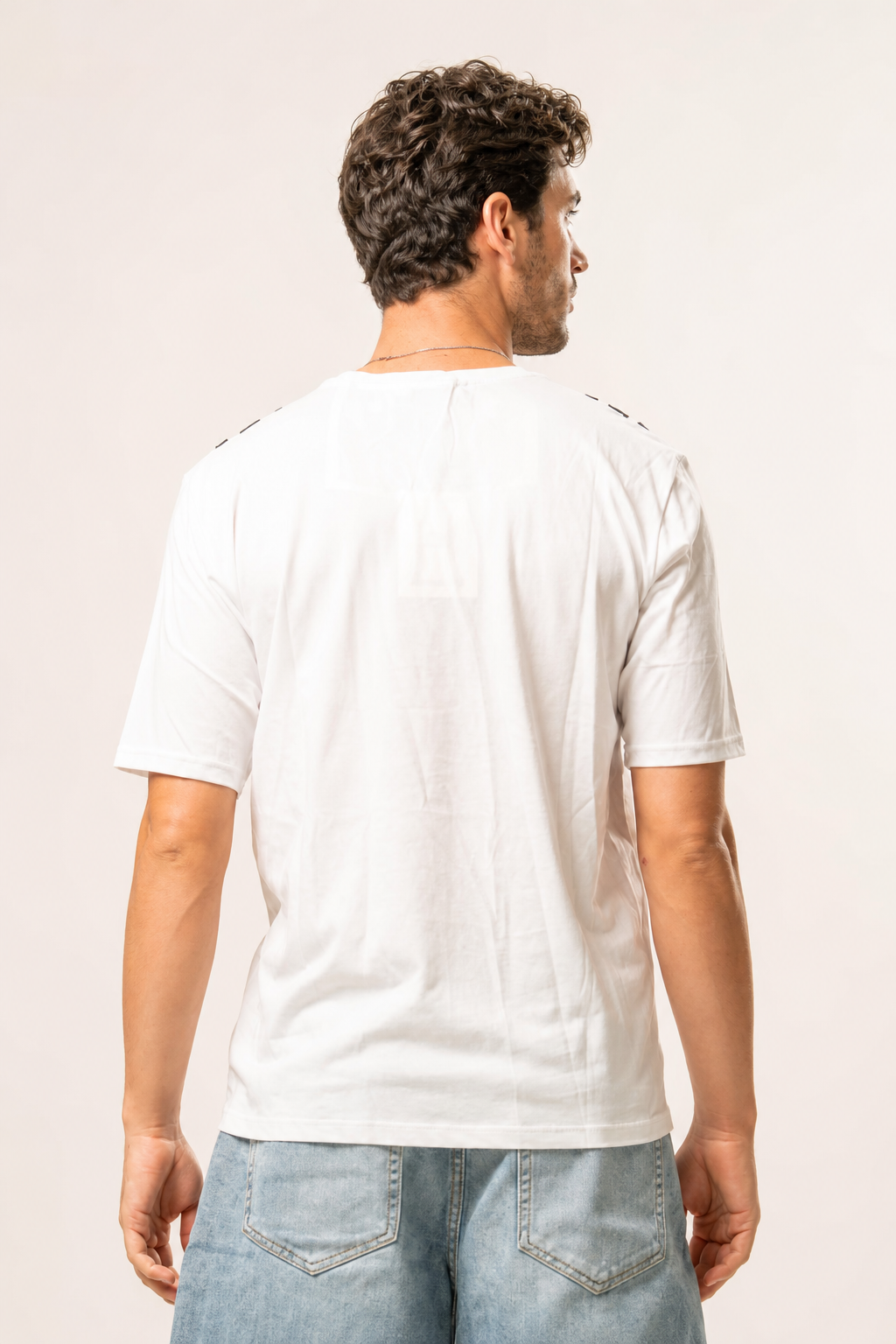 T-shirt con stricie sui lati